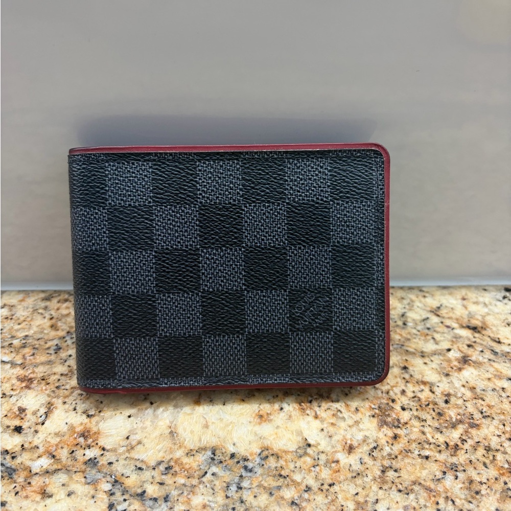 Louis Vuitton damier graphite bi fold wallet with red detail